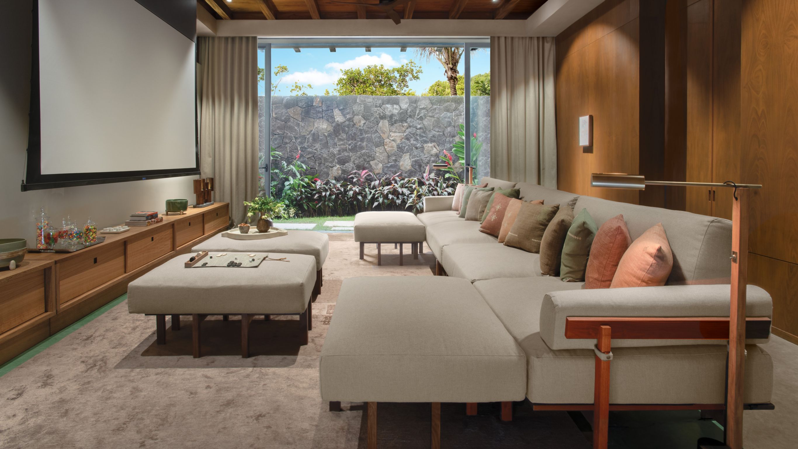 Beachfront Villa_Media Room with grey sofa and chairs